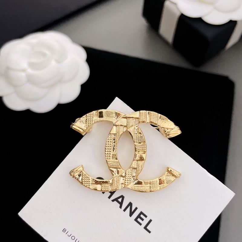 Ch**el brooches